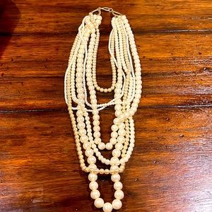 Pearls necklace . Those pearls are fake not real. Fantastic necklace !